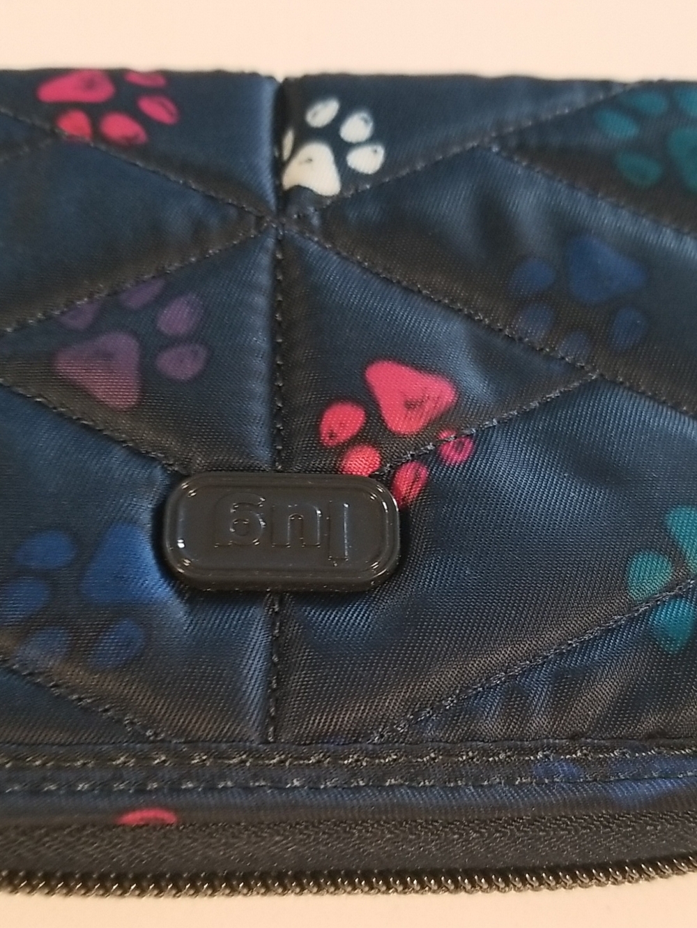 lug Rodeo Quilted Paw Print Wristlet